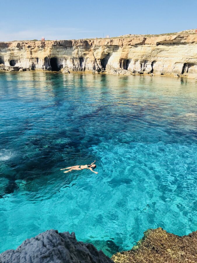 A Woman Swimming on the Sea