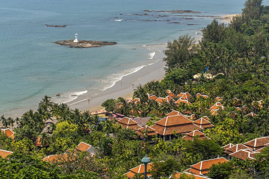 Aerial Shot Of Houses Near The Ocean