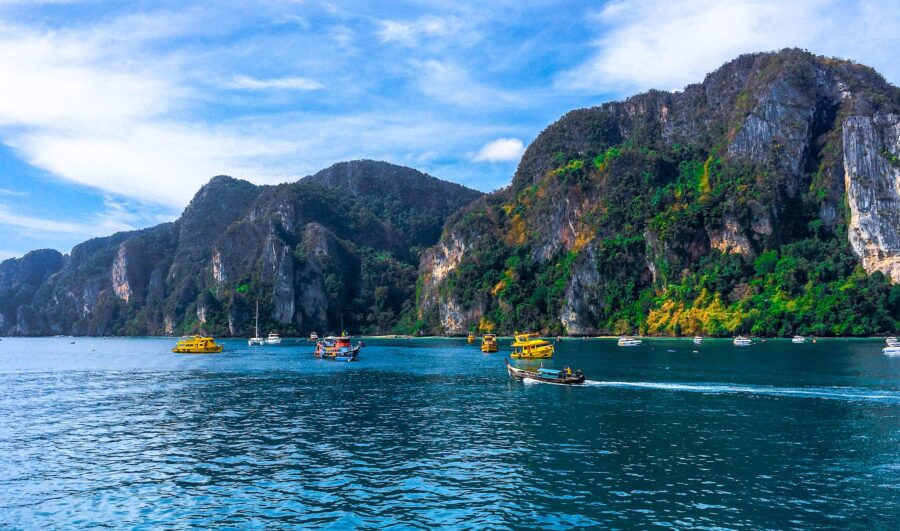 Boats Near Rocky Mountains