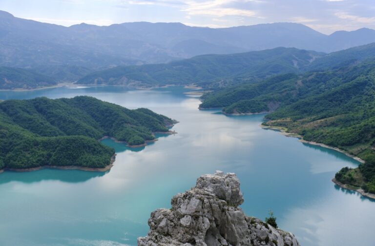 Gray Rocky Mountain Beside Lake