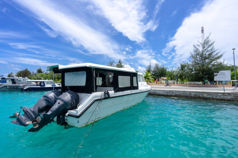 White and Black Boat on Water