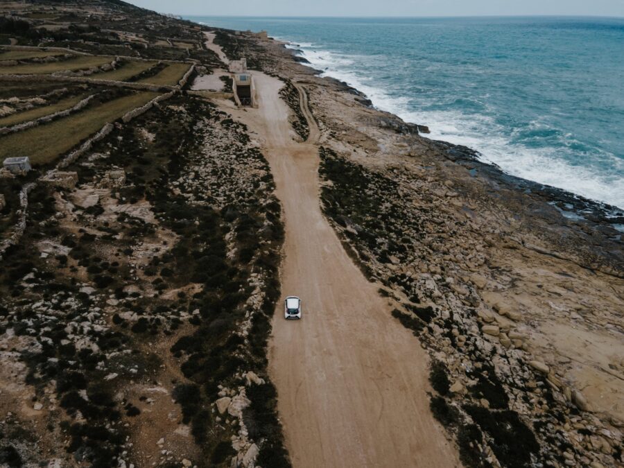 White Car on Brown Dirt Road