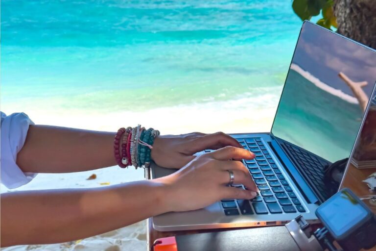 digital nomad working by the beach 1024x683 1