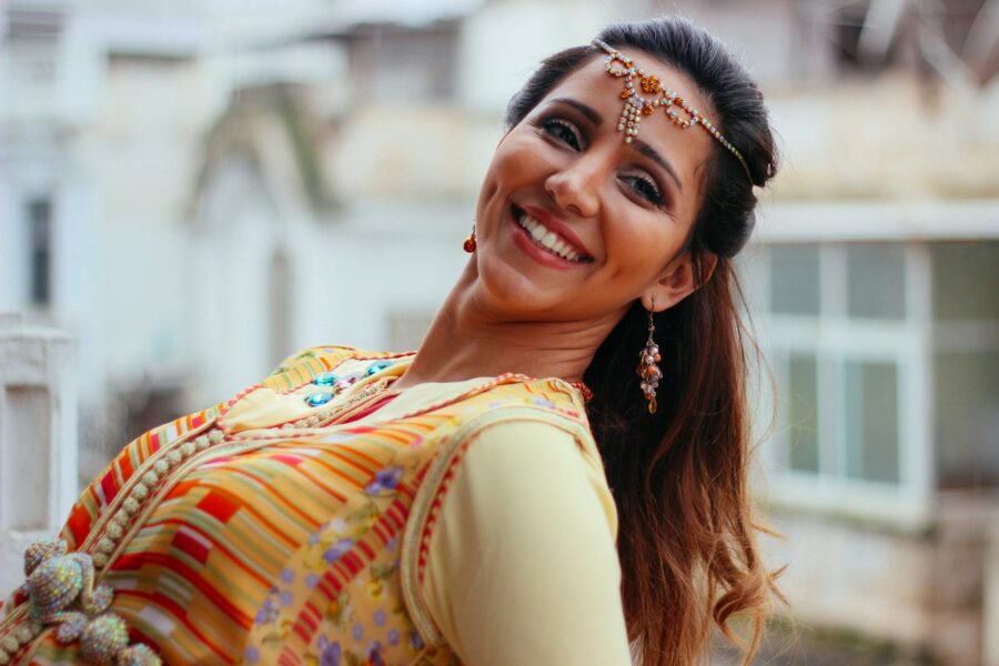 woman leaning while smiling