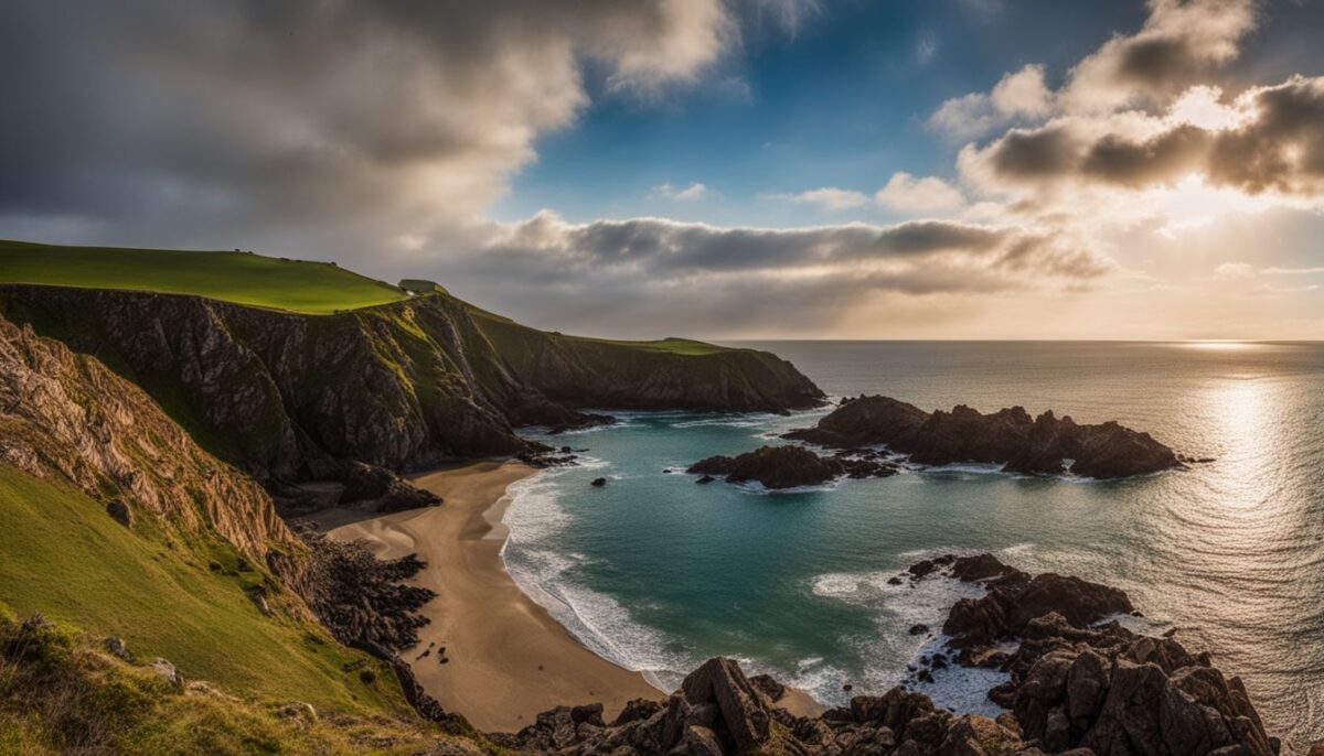 A panoramic view of the picturesque coastline of Jersey, Guernsey, or the Isle of Man.